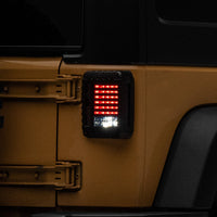 Raxiom 07-18 Jeep Wrangler JK LED Tail Lights- Black Housing (Smoked Lens) - Lights