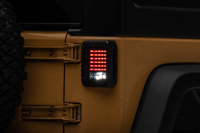 Raxiom 07-18 Jeep Wrangler JK LED Tail Lights- Black Housing (Smoked Lens) - Lights