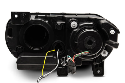 Raxiom 08-14 Dodge Challenger Halo Projctr Headlights w/Sequential Turn Signals-Blk Hsng(Clear Lens) - Lights