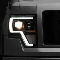 Raxiom 09-14 Ford F-150 G4 Projector Headlights- Black Housing (Clear Lens) - Lights