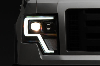 Raxiom 09-14 Ford F-150 G4 Projector Headlights- Black Housing (Clear Lens) - Lights