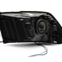 Raxiom 09-18 Dodge RAM 1500 LED Bar Headlights- Black Housing (Clear Lens) - Lights