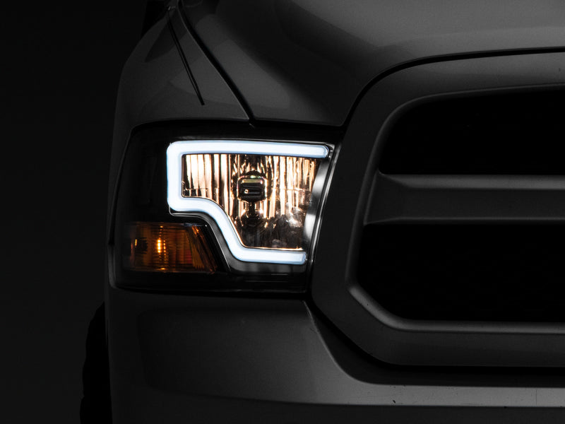Raxiom 09-18 Dodge RAM 1500 LED Bar Headlights- Black Housing (Clear Lens) - Lights