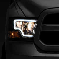 Raxiom 09-18 Dodge RAM 1500 LED Bar Headlights- Black Housing (Clear Lens) - Lights