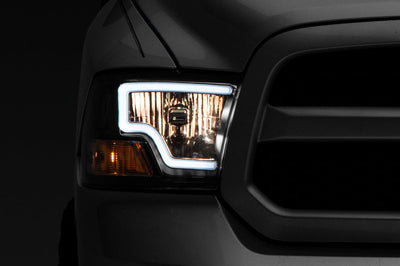 Raxiom 09-18 Dodge RAM 1500 LED Bar Headlights- Black Housing (Clear Lens) - Lights