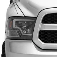 Raxiom 09-18 Dodge RAM 1500 LED Bar Headlights- Black Housing (Clear Lens) - Lights
