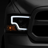Raxiom 09-18 Dodge RAM 1500 LED Bar Headlights- Black Housing (Clear Lens) - Lights