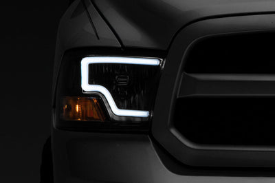 Raxiom 09-18 Dodge RAM 1500 LED Bar Headlights- Black Housing (Clear Lens) - Lights