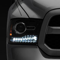 Raxiom 09-18 Dodge RAM 1500 LED Halo Headlights w/Switchback Turn Signals- Blk Housing (Clear Lens) - Lights