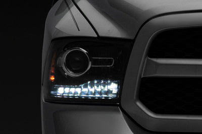 Raxiom 09-18 Dodge RAM 1500 LED Halo Headlights w/Switchback Turn Signals- Blk Housing (Clear Lens) - Lights