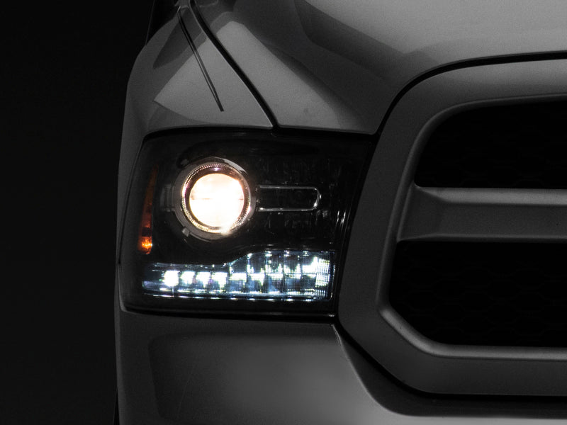 Raxiom 09-18 Dodge RAM 1500 LED Halo Headlights w/Switchback Turn Signals- Blk Housing (Clear Lens) - Lights