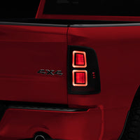 Raxiom 09-18 Dodge RAM 1500 LED Tail Lights- Black Housing (Smoked Lens) - Lights