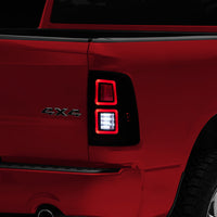 Raxiom 09-18 Dodge RAM 1500 LED Tail Lights- Black Housing (Smoked Lens) - Lights