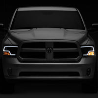 Raxiom 09-18 RAM 1500 LED Halo Projector Headlights- Black Housing (Clear Lens) - Lights