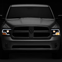 Raxiom 09-18 RAM 1500 LED Halo Projector Headlights- Black Housing (Clear Lens) - Lights