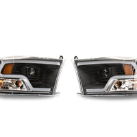 Raxiom 09-18 RAM 1500 LED Halo Projector Headlights- Black Housing (Clear Lens) - Lights