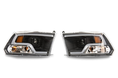 Raxiom 09-18 RAM 1500 LED Halo Projector Headlights- Black Housing (Clear Lens) - Lights