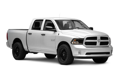 Raxiom 09-18 RAM 1500 LED Halo Projector Headlights- Black Housing (Clear Lens) - Lights