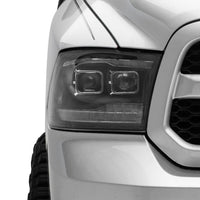 Raxiom 09-18 RAM 1500 LED Projector Headlights w/ Switchback Turn Signals- Blk Housing (Clear Lens) - Lights