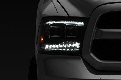 Raxiom 09-18 RAM 1500 LED Projector Headlights w/ Switchback Turn Signals- Blk Housing (Clear Lens) - Lights