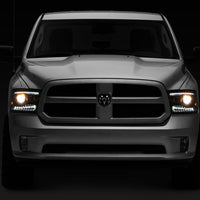 Raxiom 09-18 RAM 1500 LED Projector Headlights w/ Switchback Turn Signals- Blk Housing (Clear Lens) - Lights