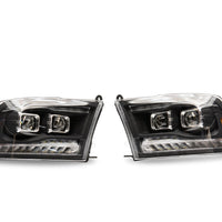 Raxiom 09-18 RAM 1500 LED Projector Headlights w/ Switchback Turn Signals- Blk Housing (Clear Lens) - Lights