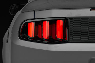 Raxiom 10-12 Ford Mustang Vector V2 LED Tail Lights - Gloss Black Housing (Clear Lens)
