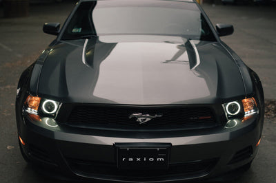 Raxiom 10-12 Ford Mustang w/ Headlights CCFL Halo Projector Headlights- Black Housing (Clear Lens) - Lights