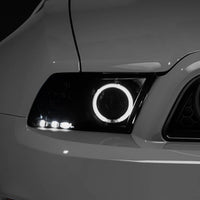 Raxiom 13-14 Ford Mustang w/ Factory HIDLED Halo Projector Headlights- Black Housing (Smoked Lens) - Lights