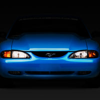 Raxiom 94-98 Mustang Axial Series Cobra Style Headlights- Black Housing (Clear Lens) - Lights