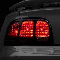 Raxiom 96-98 Ford Mustang Tail Lights- Black Housing (Smoked Lens) - Lights