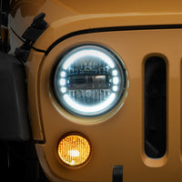 Raxiom 97-18 Jeep Wrangler TJ/JK Axial 7-Inch LED Headlights w/ DRL- Black Housing (Clear Lens) - Lights