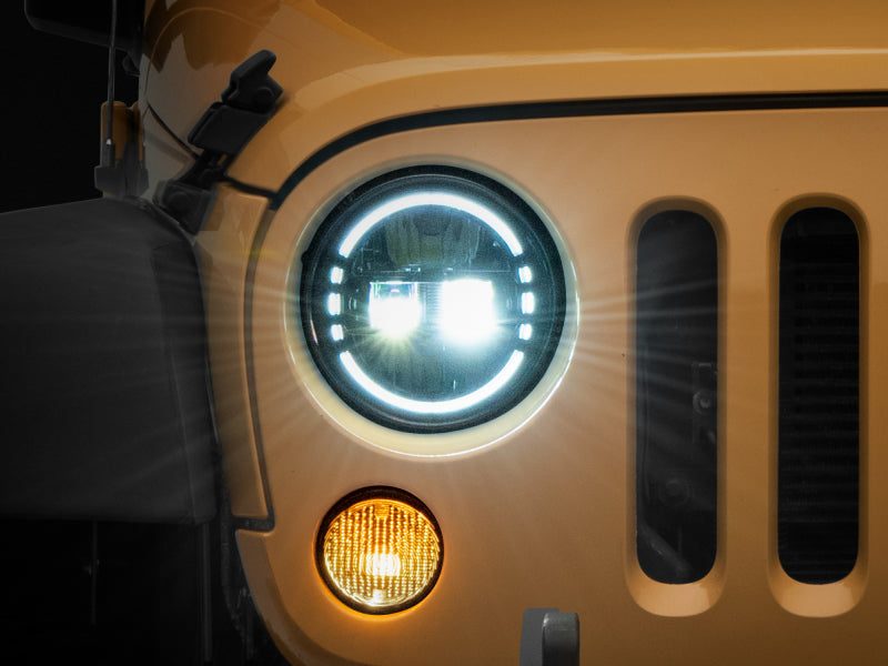Raxiom 97-18 Jeep Wrangler TJ/JK Axial 7-Inch LED Headlights w/ DRL- Black Housing (Clear Lens) - Lights