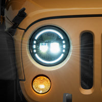 Raxiom 97-18 Jeep Wrangler TJ/JK Axial 7-Inch LED Headlights w/ DRL- Black Housing (Clear Lens) - Lights