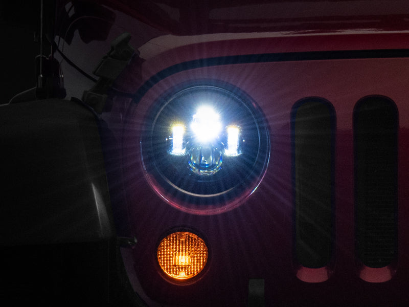 Raxiom 97-18 Jeep Wrangler TJ/JK Axial Series LED Daymaker Headlights- Black Housing (Clear Lens) - Lights