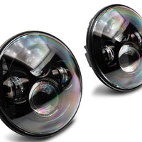 Raxiom 97-18 Jeep Wrangler TJ/JK Axial Series LED Daymaker Headlights- Black Housing (Clear Lens) - Lights