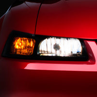 Raxiom 99-04 Ford Mustang Axial Series OE Style Headlights- Black Housing (Smoked Lens) - Lights