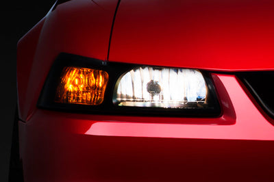 Raxiom 99-04 Ford Mustang Axial Series OE Style Headlights- Black Housing (Smoked Lens) - Lights
