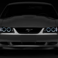 Raxiom 99-04 Ford Mustang Dual LED Halo Projector Headlights- Black Housing (Smoked Lens) - Lights