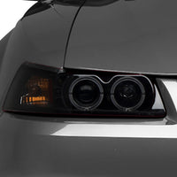 Raxiom 99-04 Ford Mustang Dual LED Halo Projector Headlights- Black Housing (Smoked Lens) - Lights