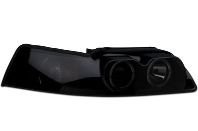 Raxiom 99-04 Ford Mustang Dual LED Halo Projector Headlights- Black Housing (Smoked Lens) - Lights