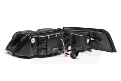 Raxiom 99-04 Ford Mustang Dual LED Halo Projector Headlights- Black Housing (Smoked Lens) - Lights