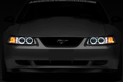 Raxiom 99-04 Ford Mustang Dual LED Halo Projector Headlights- Chrome Housing (Clear Lens) - Lights