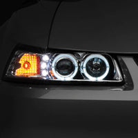 Raxiom 99-04 Ford Mustang Dual LED Halo Projector Headlights- Chrome Housing (Clear Lens) - Lights