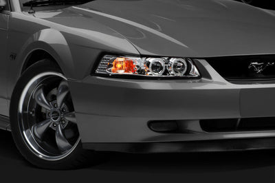 Raxiom 99-04 Ford Mustang Dual LED Halo Projector Headlights- Chrome Housing (Clear Lens) - Lights