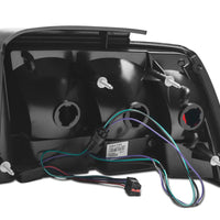 Raxiom 99-04 Ford Mustang Excluding 99-01 Cobra Icon LED Tail Lights- Black Housing (Smoked Lens) - Lights