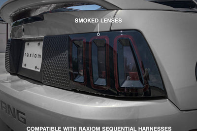 Raxiom 99-04 Ford Mustang Excluding 99-01 Cobra Icon LED Tail Lights- Black Housing (Smoked Lens) - Lights