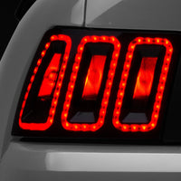 Raxiom 99-04 Ford Mustang Excluding 99-01 Cobra Icon LED Tail Lights- Black Housing (Smoked Lens) - Lights