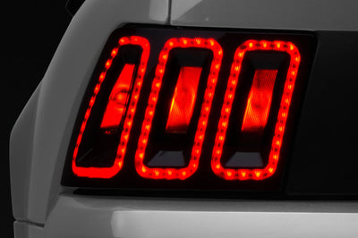 Raxiom 99-04 Ford Mustang Excluding 99-01 Cobra Icon LED Tail Lights- Black Housing (Smoked Lens) - Lights