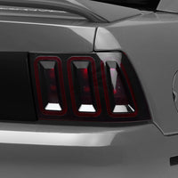 Raxiom 99-04 Ford Mustang Excluding 99-01 Cobra Icon LED Tail Lights- Black Housing (Smoked Lens) - Lights